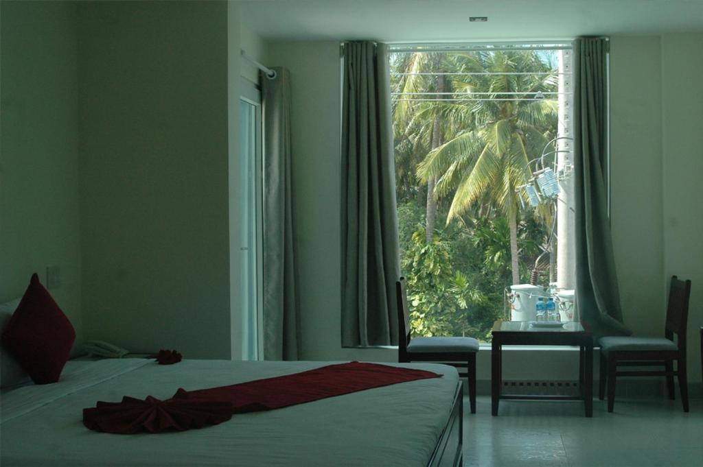 Ha Anh Hotel - Mui Ne Room photo