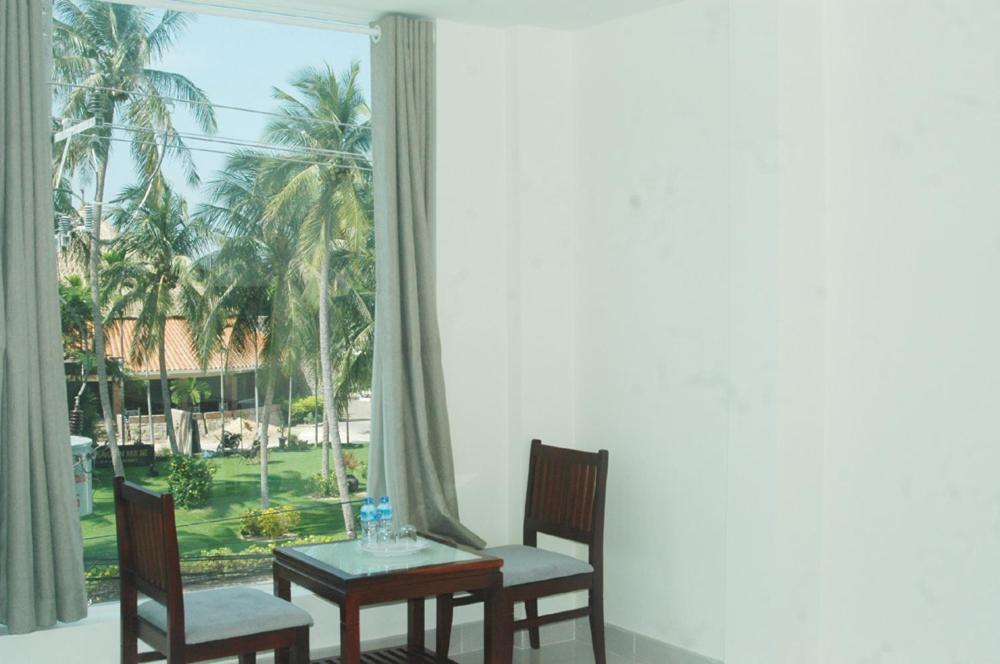 Ha Anh Hotel - Mui Ne Room photo